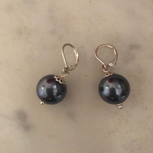 Earring, gray pearl with silver latch and detail.